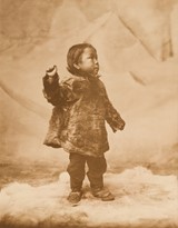 
Untitled (Inuit child wearing fur parka)
