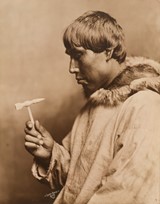 
Untitled (Inuit man in profile with small hammer)